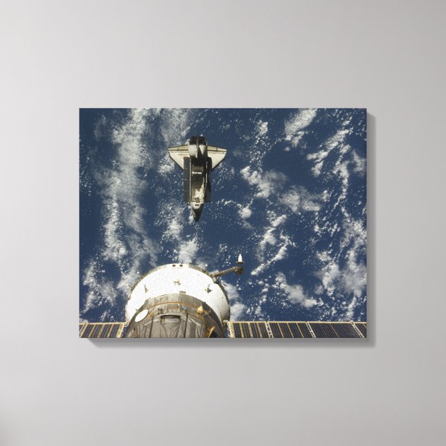 Space Shuttle Endeavour and a Soyuz spacecraft Canvas Print (Front)