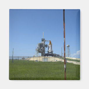 Space shuttle Endeavour is framed by a windsock Magnet