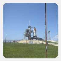 Space shuttle Endeavour is framed by a windsock