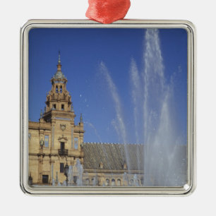 Spain, Sevilla, Andalucia Fountain and ornate Metal Tree Decoration