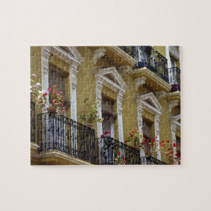 Spain, Sevilla, Andalucia Geraniums hang over Jigsaw Puzzle