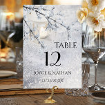 Sparkling Snow Winter Wedding Table Number Card<br><div class="desc">Table number card with a winter wonderland scene with a candle lit lantern in sparkling snow.
Beautiful for a winter or Christmas wedding.
You can customise,  drag,  rotate or delete the text fields. It is also possible to change fonts and more. For all options,  choose "customise it".</div>