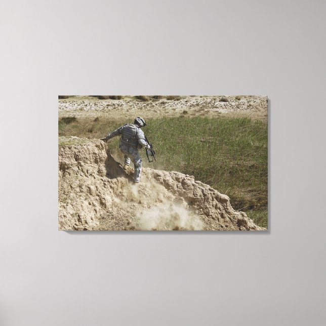 Specialist climbs down canvas print (Front)