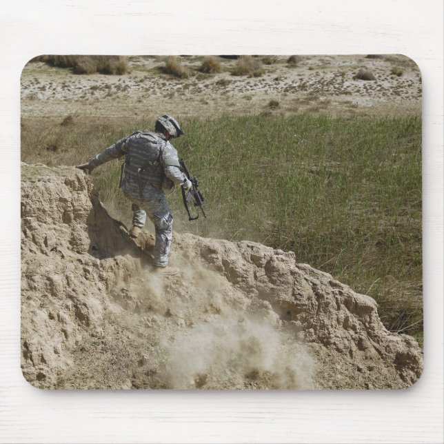 Specialist climbs down mouse mat (Front)