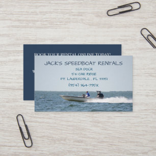 Speed boat on the open ocean rental boat business card
