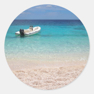 Speedboat in the blue sea classic round sticker