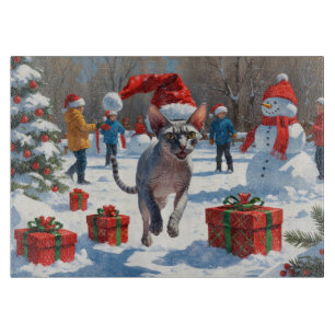 Sphynx Cat Running in Snow with Christmas Hat Cutting Board