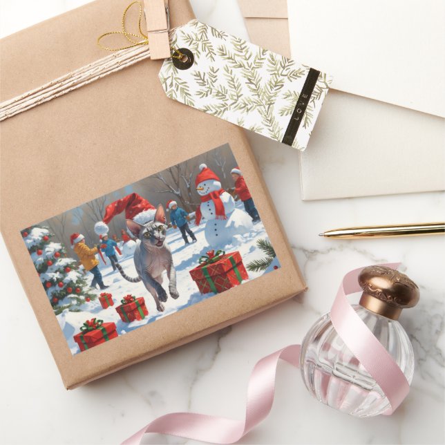 Sphynx Cat Running in Snow with Christmas Hat Rectangular Sticker (Gifting)