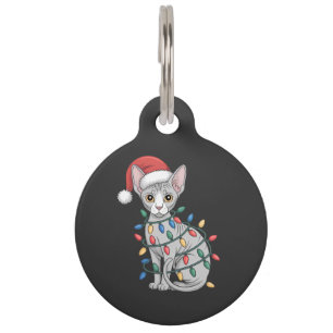 Sphynx Cat Wearing a Santa Hat and Wrapped in Xmas Pet Tag