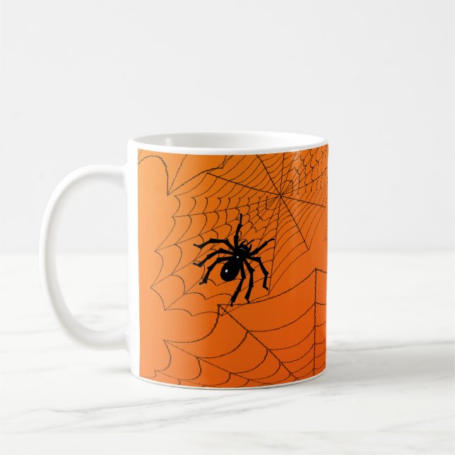 Spiderwebs on Orange Coffee Mug (Left)