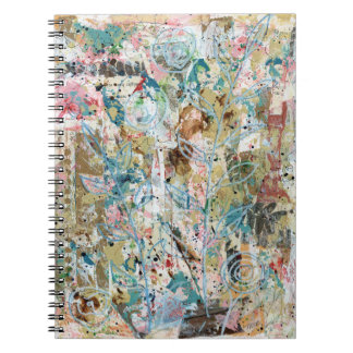 Spiral notebook with mixed media floral artwork.