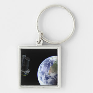 Spitzer departing the Earth soon after launch Key Ring