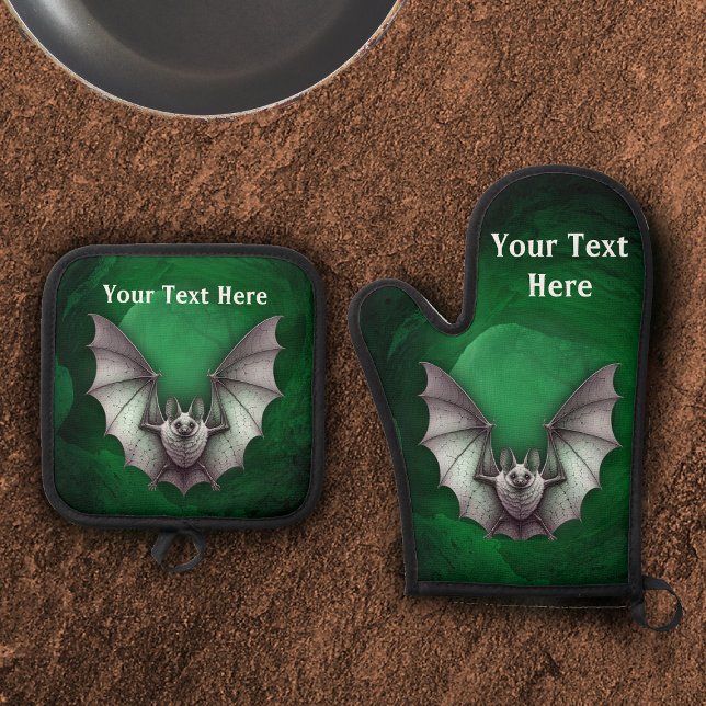 Spooky Grey Flying Bat Glowing Green Cave Oven Mitt & Pot Holder Set (Spooky grey bat wings spread in flight glowing green cave with trees on oven mitt and potholder.)
