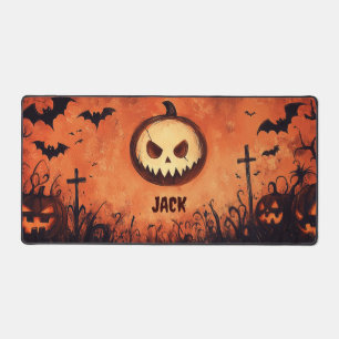 Spooky Halloween Scene with Pumpkins and Bats Desk Mat