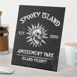 Spooky Island Est 2002 Amusement Park Skull Pedestal Sign