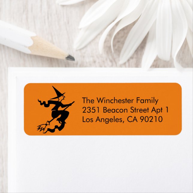 Spooky orange black flying witch Halloween address (Insitu)