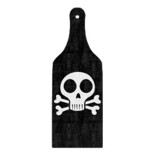 spooky skull on a black background cutting board
