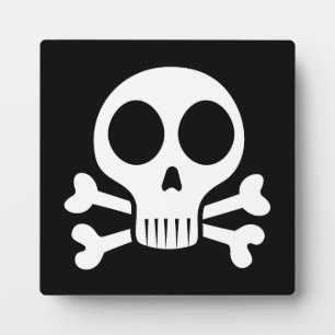 spooky skull on a black background plaque