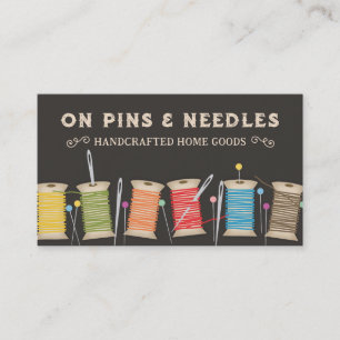 Spools of thread pins, needles sewing biz cards
