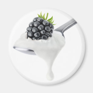 Spoon of blackberry yogurt magnet