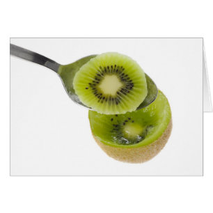 Spoon scooping kiwifruit