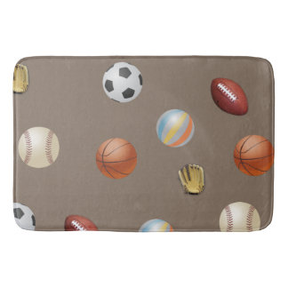 Sports ball's on a bath mat