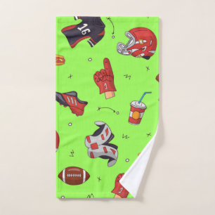 Sports gear on green hand towel