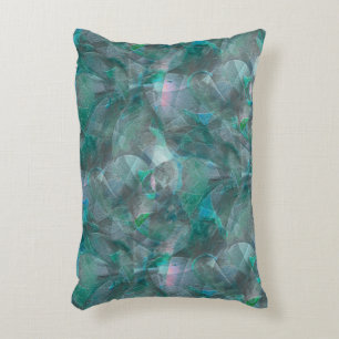 Spoted greenish cyan over unfinished wall plaster  decorative cushion
