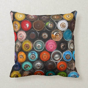 Spray paint cans, graffiti, cushion