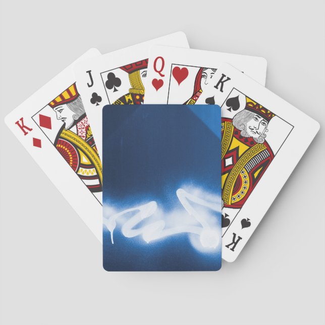 Sprayed graffiti on blue metal playing cards (Back)