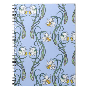 Spring flowers. Daffodil flowers interlaced into a Notebook