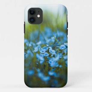 Spring flowers on field iPhone 11 case