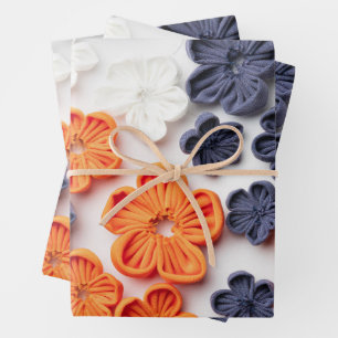 Spring handmade sewn fabric flowers orange blue wrapping paper sheet