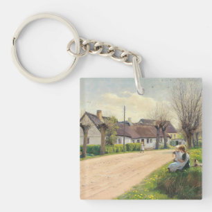 Spring in the village with girls on the roadside key ring