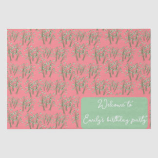 Spring snowdrop bunches on coral pink tissue paper