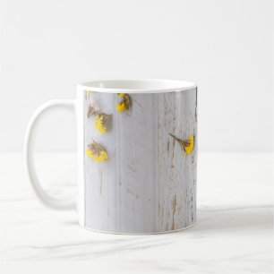 Spring yellow flowers, white plank decor. coffee mug