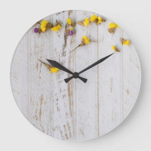 Spring yellow flowers, white plank decor. large clock