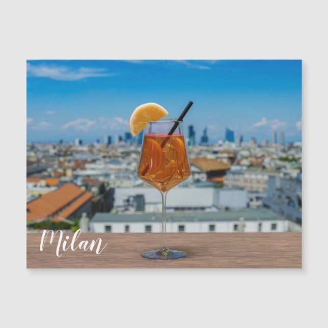 Spritz cocktail on a table with view of Milan (Front)