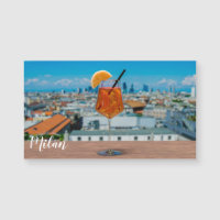 Spritz cocktail on a table with view of Milan