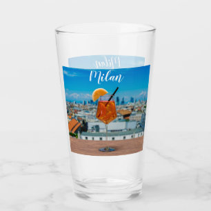 Spritz cocktail on a table with view of Milan Glass