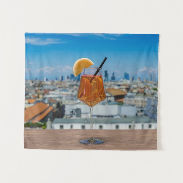 Spritz cocktail on a table with view of Milan Tapestry (Front (Horizontal))