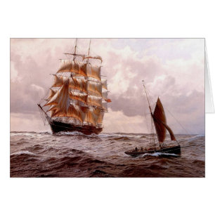 Square-rigger and traditional boat at sea