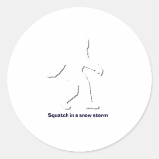 Squatch in a snow storm classic round sticker