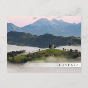 St. Thomas church with mountains in Slovenia bar Postcard