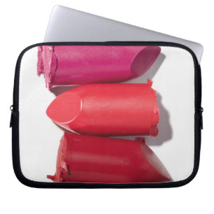 Stack of broken lipstick laptop sleeve