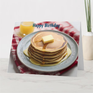 Stack of pancakes on plate covered with syrup  card