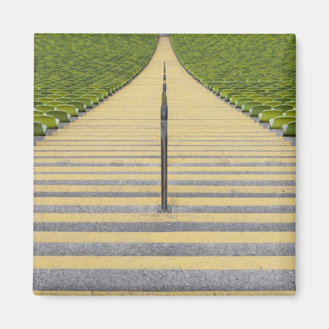 Stadium stairway between rows of green seats magnet (Front)