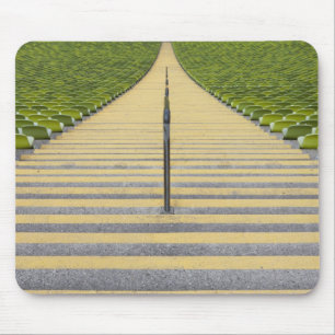 Stadium stairway between rows of green seats mouse mat