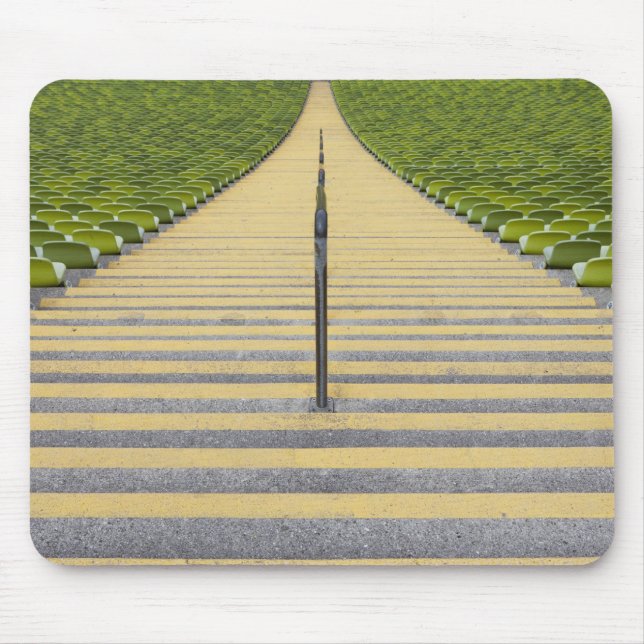 Stadium stairway between rows of green seats mouse mat (Front)