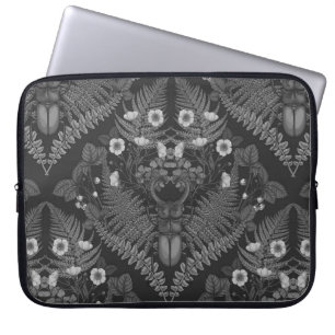 Stag beetle and ferns, in black and white laptop sleeve